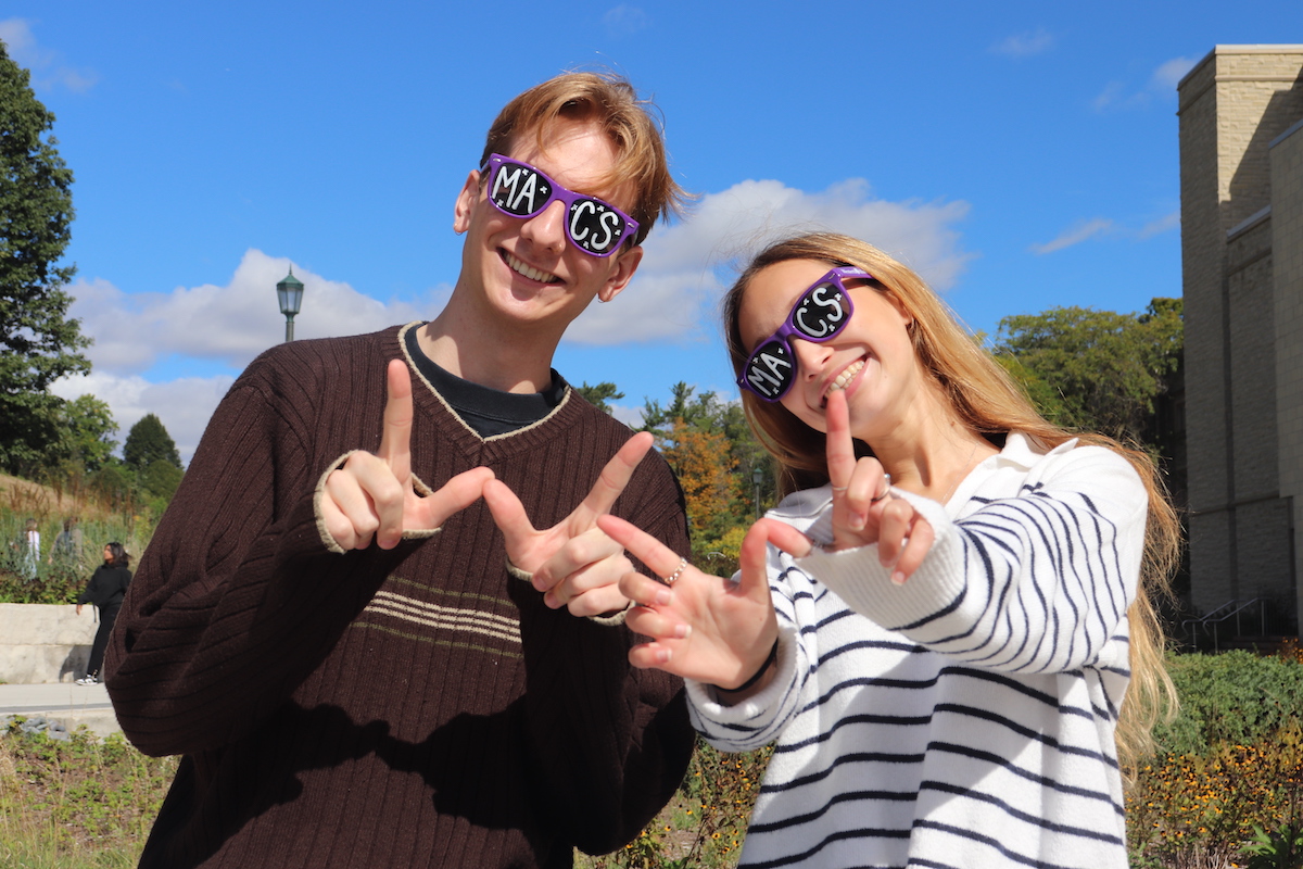 Media and Communication Studies students with MACS on their sunglasses