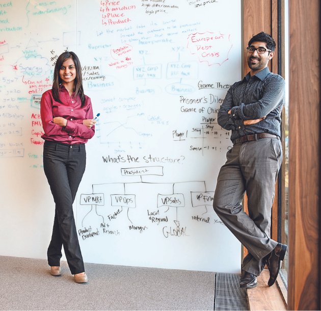 Two students at a whiteboard