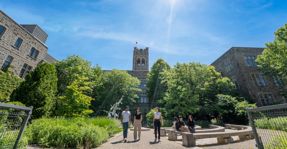Students in the Beryl Ivey Garden outside University College - the primary building for Arts and Humanities classses