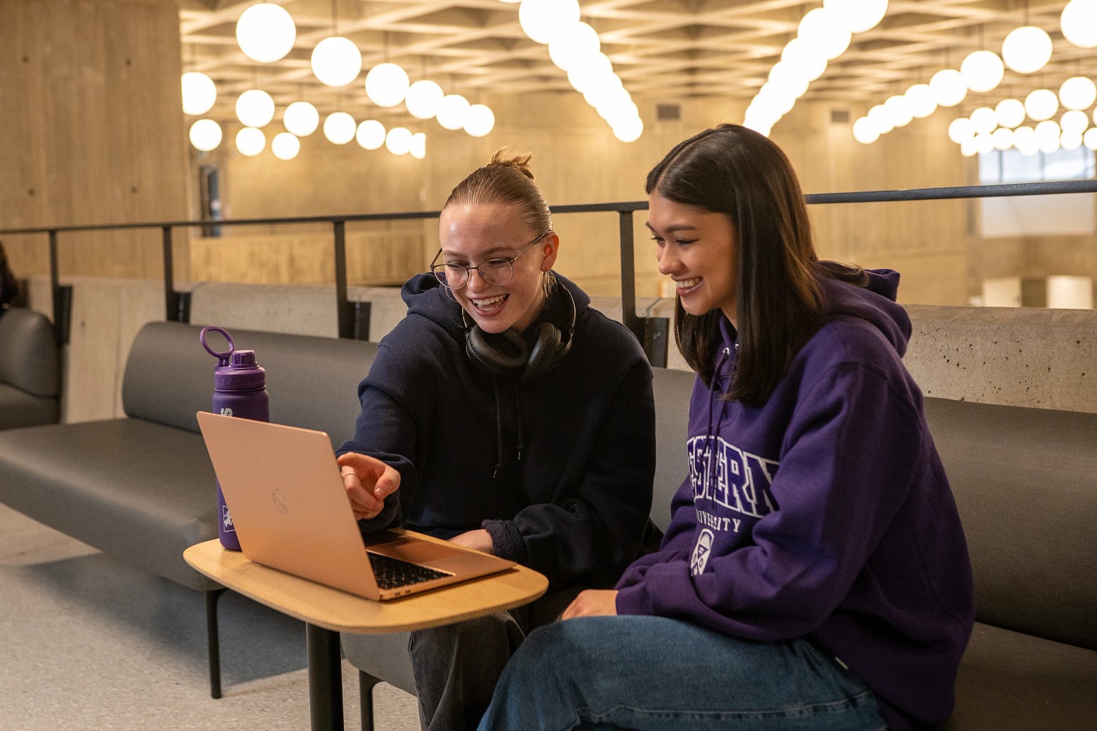 students looking at a computer